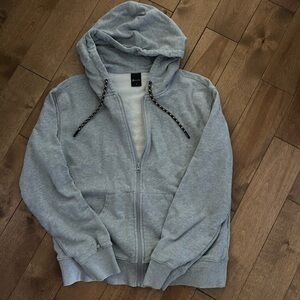 gray jacket (peloton)